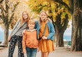 Outdoor portrait of 3 funny kids Royalty Free Stock Photo