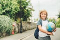 Outdoor portrait of funny little schoolboy Royalty Free Stock Photo