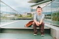 Outdoor portrait of funny little schoolboy Royalty Free Stock Photo