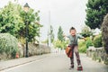 Outdoor portrait of funny little schoolboy Royalty Free Stock Photo