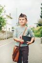 Outdoor portrait of funny little schoolboy Royalty Free Stock Photo