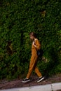 Outdoor portrait of girl in sport costume walking city streets Royalty Free Stock Photo