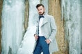 Outdoor portrait of handsome man in gray coat Royalty Free Stock Photo