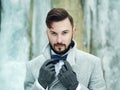 Outdoor portrait of handsome man in gray coat Royalty Free Stock Photo