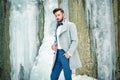 Outdoor portrait of handsome man in gray coat Royalty Free Stock Photo