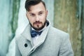 Outdoor portrait of handsome man in gray coat Royalty Free Stock Photo