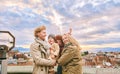 Outdoor portrait of happy family of four, young couple with two little children, cold weather, Royalty Free Stock Photo