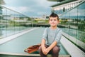 Outdoor portrait of funny little schoolboy Royalty Free Stock Photo