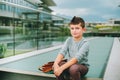 Outdoor portrait of funny little schoolboy Royalty Free Stock Photo