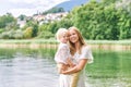Outdoor portrait of happy young mother with adorable preschooler son Royalty Free Stock Photo