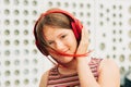 Outdoor portrait of pretty teenage girl with red dyed hair Royalty Free Stock Photo