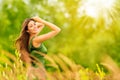 Outdoor Portrait of Happy Young Woman in Nature. Attractive Girl in Sunny Summer Park Royalty Free Stock Photo