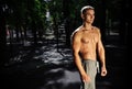 Outdoor portrait of healthy handsome active man with fit muscular body, sports and fitness concept Royalty Free Stock Photo