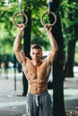 Outdoor portrait of healthy handsome active man with fit muscular body, sports and fitness concept Royalty Free Stock Photo