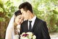 Loving asian newly-wed couple Royalty Free Stock Photo