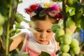 Outdoor portrait of little girl in orchard