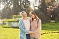 Outdoor portrait of mother and teenage girl