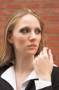 Outdoor portrait of a pretty blonde girl in a formal dress Royalty Free Stock Photo