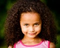 Outdoor portrait of pretty mixed race girl