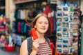 Outdoor portrait of pretty teenage girl with red dyed hair Royalty Free Stock Photo