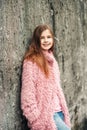 Outdoor portrait of pretty young kid girl