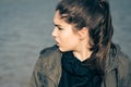 Outdoor portrait in profile of a thoughtful teenage girl Royalty Free Stock Photo