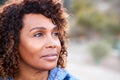 Outdoor Portrait Of Serious African American Senior Woman With Mental Health Concerns