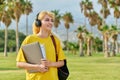 Outdoor portrait of teenage female student with laptop backpack. Royalty Free Stock Photo