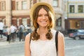 Outdoor portrait of teenage girl 13, 14 years old, city street background Royalty Free Stock Photo