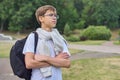 Outdoor portrait of teenager schoolboy with glasses backpack Royalty Free Stock Photo