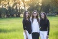 Outdoor Portrait of three beautiful Hispanic women standing together outdoors Royalty Free Stock Photo