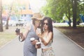 Outdoor portrait of three friends take selfie with smartphone Royalty Free Stock Photo