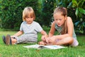 Outdoor portrait of two adorable kids Royalty Free Stock Photo