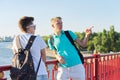 Outdoor portrait of two friends boys teenagers 15, 16 years old, talking laughing Royalty Free Stock Photo