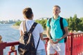 Outdoor portrait of two friends teenagers boys 15, 16 years old, laughing, talking Royalty Free Stock Photo