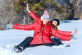 Outdoor portrait of two girls have fun and enjoy the fresh snow on a beautiful winter day in winter park. Royalty Free Stock Photo