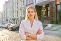 Outdoor portrait of young beautiful woman on city street Royalty Free Stock Photo