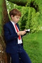 Outdoor portrait of boy going to First Holy Communion Royalty Free Stock Photo