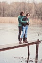 outdoor portrait of young happy loving couple walking in early spring Royalty Free Stock Photo