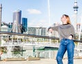 Outdoor portrait of young happy smiling teen girl enjoying her t Royalty Free Stock Photo