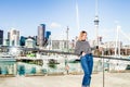 Outdoor portrait of young happy smiling teen girl enjoying her t Royalty Free Stock Photo