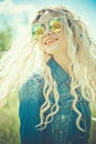 Outdoor portrait of young hippie woman