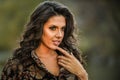 Outdoor portrait of young pretty beautiful woman posing in autumn park Royalty Free Stock Photo