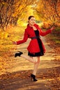 Outdoor portrait of young redheaded woman in autumn forest Royalty Free Stock Photo