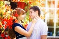 Outdoor portrait of young sensual couple. Love and kiss. Summer