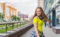 Outdoor portrait of young teenager brunette girl