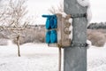 Outdoor power plug socket box with cover on the steel pole Royalty Free Stock Photo