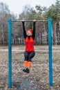 Outdoor Pull-up Bar and Parallel Bars workout. Socially distant bootcamps. Group fitness workout classes outdoors in Royalty Free Stock Photo