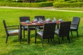 Outdoor rattan furniture, table and chairs Royalty Free Stock Photo