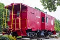 An outdoor red caboose train Royalty Free Stock Photo